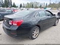 2015 Chevrolet Malibu — photo 4 of 11 | VIN 1G11C5SL9FF293525