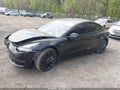 2021 Tesla Model 3 — photo 2 of 16 | VIN 5YJ3E1ECXMF061905