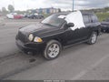 2009 Jeep Compass — photo 2 of 11 | VIN 1J4FT47B49D120528
