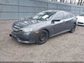 2016 Honda Civic — photo 2 of 17 | VIN 19XFC2F52GE245366