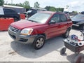2007 Kia Sportage — photo 2 of 16 | VIN KNDJF724877342907