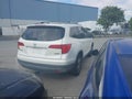 2016 Honda Pilot — photo 4 of 17 | VIN 5FNYF6H36GB044079