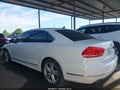 2014 Volkswagen Passat — photo 15 of 17 | VIN 1VWCT7A31EC053136