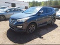 2014 Hyundai Santa Fe — photo 2 of 11 | VIN 5XYZU3LB7EG210770