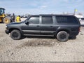 2003 Chevrolet Suburban 1500 — photo 14 of 16 | VIN 1GNFK16Z23J106584