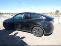 2024 Tesla Model Y — photo 12 of 15 | VIN 7SAYGAEE4RF183879