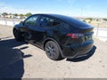 2024 Tesla Model Y — photo 3 of 15 | VIN 7SAYGAEE4RF183879