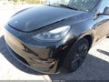 2024 Tesla Model Y — photo 6 of 15 | VIN 7SAYGAEE4RF183879