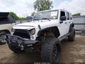 2014 Jeep Wrangler Unlimited — photo 2 of 16 | VIN 1C4BJWEG2EL209180