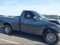 2002 Ford F-150 — photo 13 of 16 | VIN 1FTRF17232NB33392