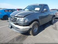 2002 Ford F-150 — photo 2 of 16 | VIN 1FTRF17232NB33392
