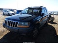 2001 Jeep Grand Cherokee — photo 2 of 11 | VIN 1J4GW48S11C606590