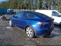 2023 Tesla Model Y — photo 3 of 20 | VIN 7SAYGDEE8PA113393