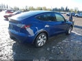 2023 Tesla Model Y — photo 4 of 20 | VIN 7SAYGDEE8PA113393