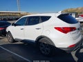 2016 Hyundai Santa Fe — photo 14 of 16 | VIN 5XYZTDLB8GG373097