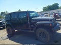 2012 Jeep Wrangler Unlimited — photo 13 of 16 | VIN 1C4BJWEG5CL169660