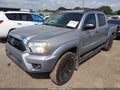 2015 Toyota Tacoma — photo 2 of 16 | VIN 5TFJU4GN5FX079134