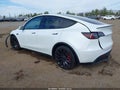 2023 Tesla Model Y — photo 3 of 18 | VIN 7SAYGDEF5PF850093