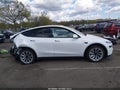 2026 Tesla Model Y — photo 13 of 16 | VIN 7SAYGDEDXTA416435
