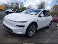 2026 Tesla Model Y — photo 2 of 16 | VIN 7SAYGDEDXTA416435