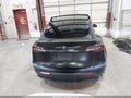2022 Tesla Model Y — photo 17 of 21 | VIN 7SAYGDEF7NF553940