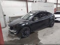 2022 Tesla Model Y — photo 2 of 21 | VIN 7SAYGDEF7NF553940
