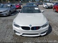 2016 BMW M4 — photo 12 of 17 | VIN WBS3R9C58GK337960