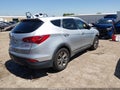 2016 Hyundai Santa Fe — photo 4 of 18 | VIN 5XYZT3LB7GG369441