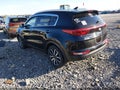 2019 Kia Sportage — photo 3 of 20 | VIN KNDPNCAC2K7562972