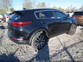 2019 Kia Sportage — photo 4 of 20 | VIN KNDPNCAC2K7562972