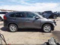 2014 Honda CR-V — photo 14 of 17 | VIN 5J6RM4H5XEL091443