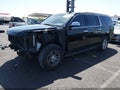 2019 Chevrolet Suburban — photo 2 of 18 | VIN 1GNSCHKC3KR347267