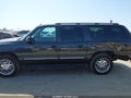2003 Chevrolet Suburban 1500 — photo 14 of 16 | VIN 3GNEC16T33G238422