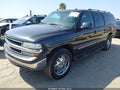 2003 Chevrolet Suburban 1500 — photo 2 of 16 | VIN 3GNEC16T33G238422