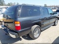 2003 Chevrolet Suburban 1500 — photo 4 of 16 | VIN 3GNEC16T33G238422
