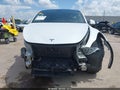 2023 Tesla Model Y — photo 13 of 21 | VIN 7SAYGDEE2PA088474