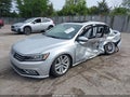 2017 Volkswagen Passat — photo 2 of 19 | VIN 1VWCT7A3XHC065631