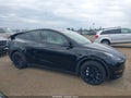 2022 Tesla Model Y — photo 12 of 17 | VIN 7SAYGDEE6NF543262