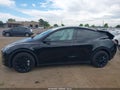 2022 Tesla Model Y — photo 13 of 17 | VIN 7SAYGDEE6NF543262