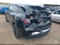 2022 Tesla Model Y — photo 3 of 17 | VIN 7SAYGDEE6NF543262