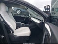 2022 Tesla Model Y — photo 5 of 17 | VIN 7SAYGDEE6NF543262