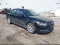 2012 Volkswagen Passat — photo 1 of 11 | VIN 1VWAP7A30CC006060