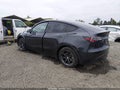 2024 Tesla Model Y — photo 3 of 21 | VIN 7SAYGDEE4RF115180