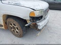 2004 GMC Yukon XL — photo 12 of 17 | VIN 1GKFK66U74J246209