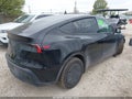 2026 Tesla Model Y — photo 4 of 15 | VIN 7SAYGDED2TA594582