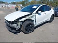 2026 Tesla Model Y — photo 2 of 23 | VIN 7SAYGDEE9TA391018