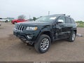 2014 Jeep Grand Cherokee — photo 2 of 17 | VIN 1C4RJEBG0EC176838