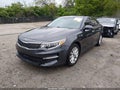 2017 Kia Optima — photo 2 of 16 | VIN 5XXGU4L39HG143832