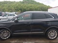 2015 Lincoln MKC — photo 13 of 15 | VIN 5LMCJ2A90FUJ41258