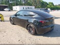 2024 Tesla Model Y — photo 3 of 17 | VIN 7SAYGDEF9RF034393